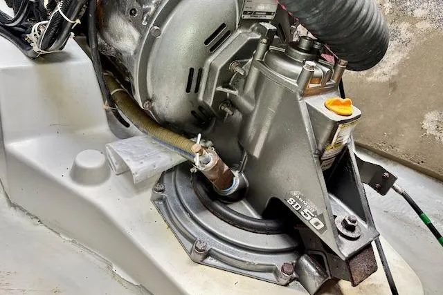 Slide: The Image of 2013 Lagoon 450 catamaran docked in marina, featuring sleek design and spacious deck. - 13