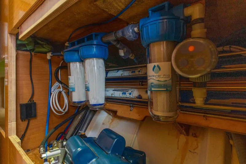 Slide: The Image of Water filtration system in a 2013 Lagoon 450 yacht interior. - 137