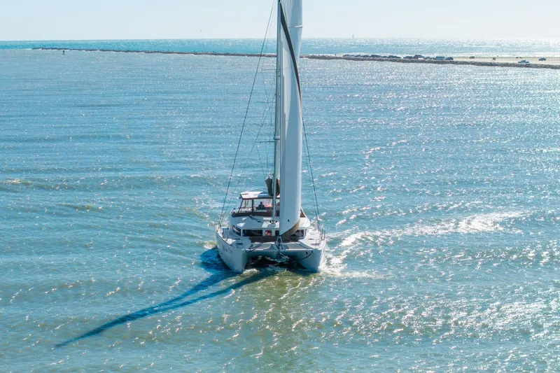 Slide: The Image of Lagoon 450 catamaran sailing on a sunny day, 2013 model. - 165