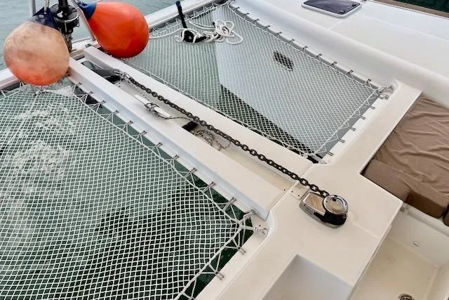 Slide: The Image of Interior view of 2013 Lagoon 450 sailboat cockpit with ropes and winches. - 19