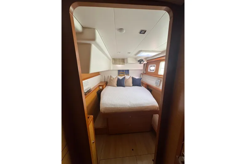 Slide: The Image of 2013 Lagoon 450 catamaran deck with ocean view and seating area. - 37