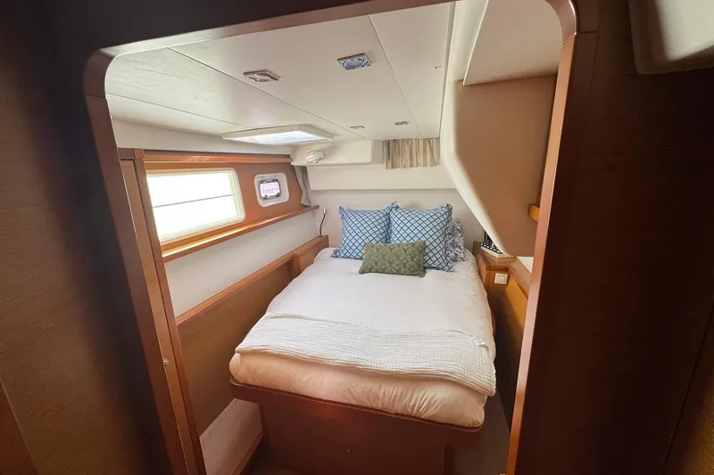 Slide: The Image of Deck of 2013 Lagoon 450 catamaran featuring anchor chain and winch system. - 40