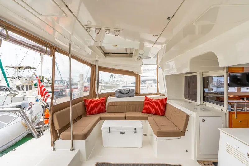 Slide: The Image of Spacious interior of 2013 Lagoon 450 catamaran with comfortable seating and modern amenities. - 53