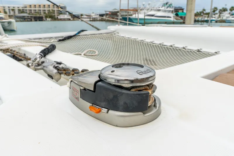 Slide: The Image of Close-up of a 2013 Lagoon 450 yacht deck with winch and ropes. - 83