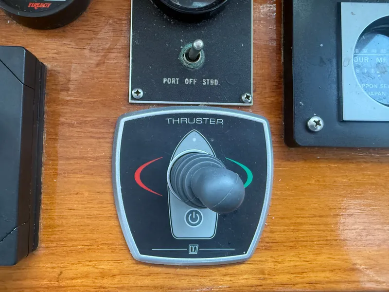Slide: The Image of Control panel of a 1998 Wilbur 38 Downeast boat with thruster joystick. - 17