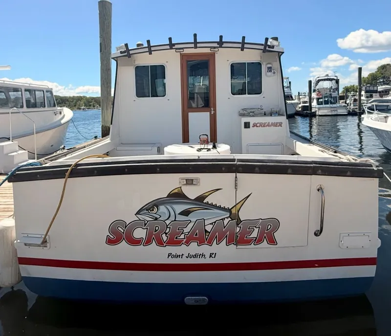 Slide: The Image of 1998 Wilbur 38 Downeast boat "Screamer" docked at marina, Point Judith, RI. - 5