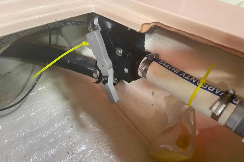 Slide: The Image of Plumbing system in 1989 Island Packet 35 sailboat, featuring pipes and valve connections. - 42