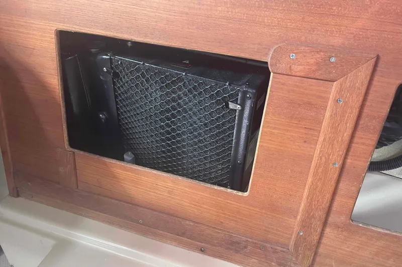 Slide: The Image of 1989 Island Packet 35 interior with wooden panel and ventilation system. - 44