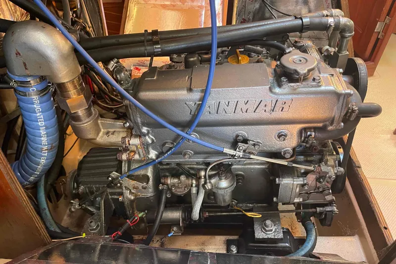 Slide: The Image of Yanmar engine in a 1989 Island Packet 35 sailboat, showcasing marine engineering. - 48