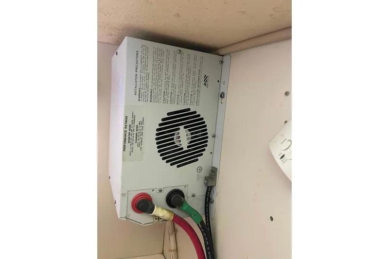 Slide: The Image of Electrical component in 1989 Island Packet 35 sailboat, featuring wiring and installation instructions. - 56