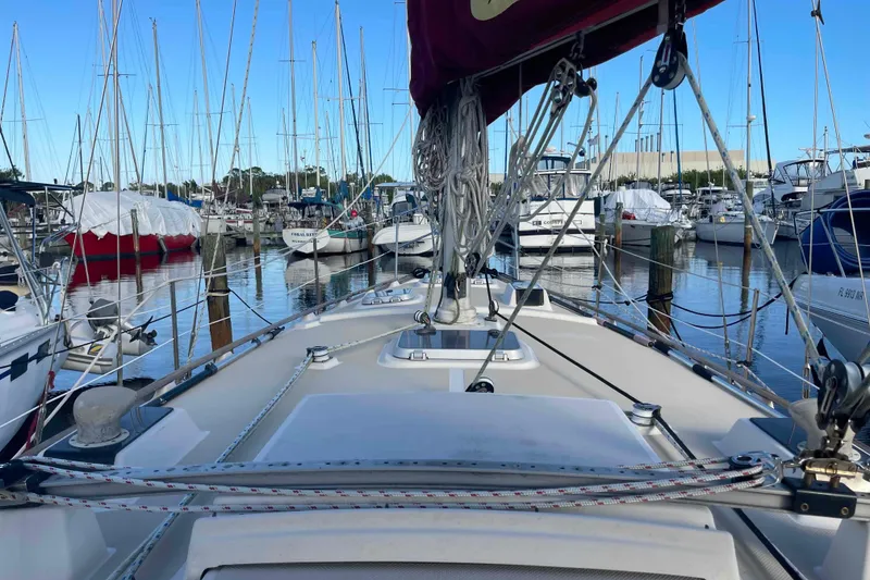 Slide: The Image of Winch with rope on 1989 Island Packet 35 sailboat deck. - 68