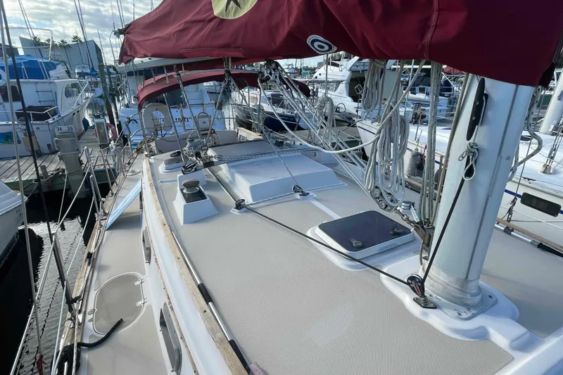 Slide: The Image of Deck of 1989 Island Packet 35 sailboat with rigging and winch. - 70