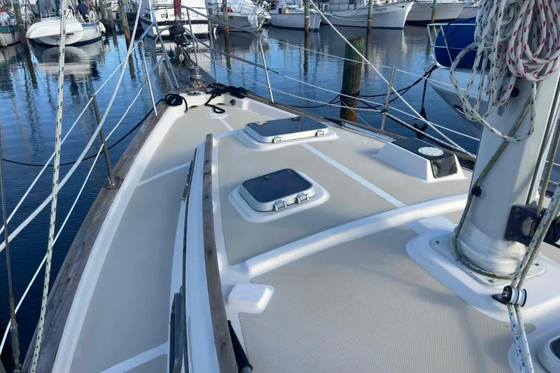 Slide: The Image of Stainless steel fitting on 1989 Island Packet 35 sailboat deck. - 76