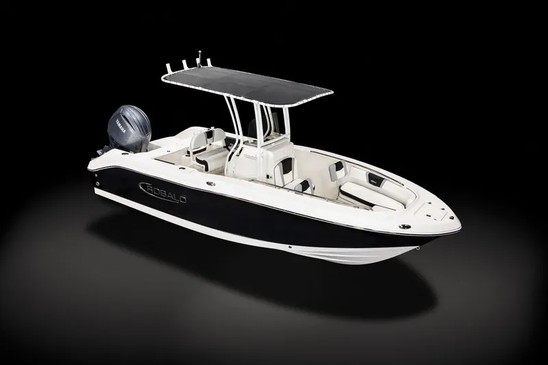 Slide: The Image of 2026 Robalo R200 Center Console boat with Yamaha outboard motor in a garage. - 3