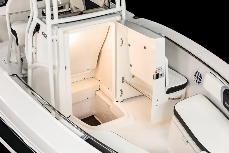 Slide: The Image of 2026 Robalo R200 Center Console interior with white and blue seating. - 9