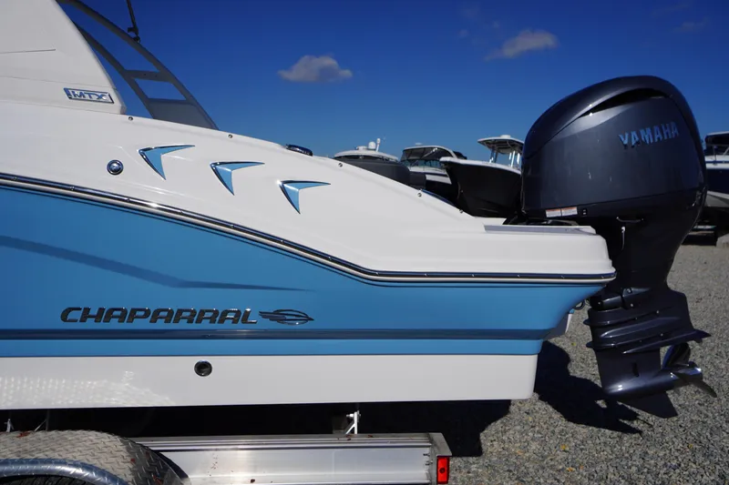 Slide: The Image of 2026 Chaparral 21 SSi OB boat with Yamaha outboard motor, side view. - 1
