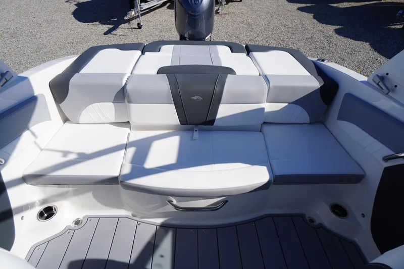 Slide: The Image of 2026 Chaparral 21 SSi OB boat interior seating with modern design and gray accents. - 41