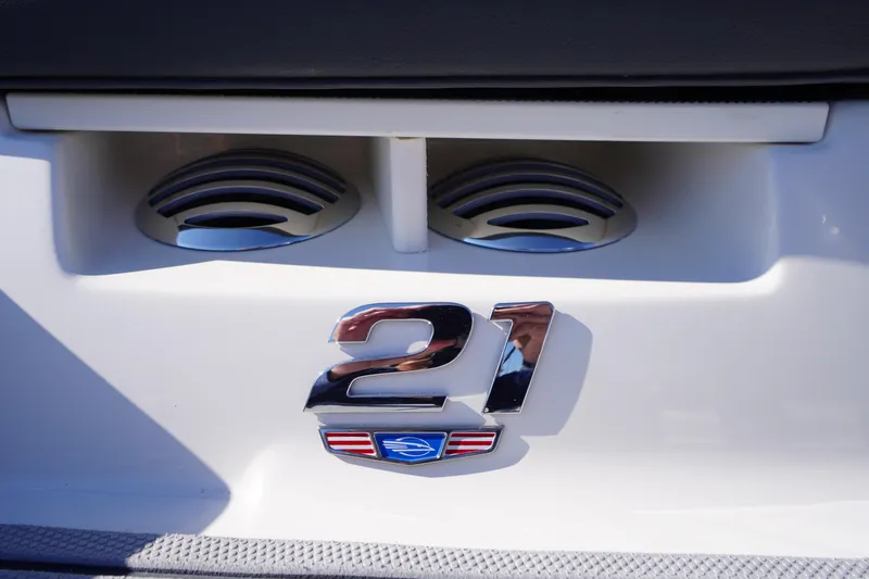 Slide: The Image of 2026 Chaparral 21 SSi OB boat emblem with stylish chrome detailing. - 57