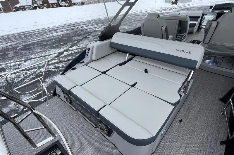 Slide: The Image of 2026 Harris Grand Mariner 230 boat interior with spacious seating and modern design. - 13