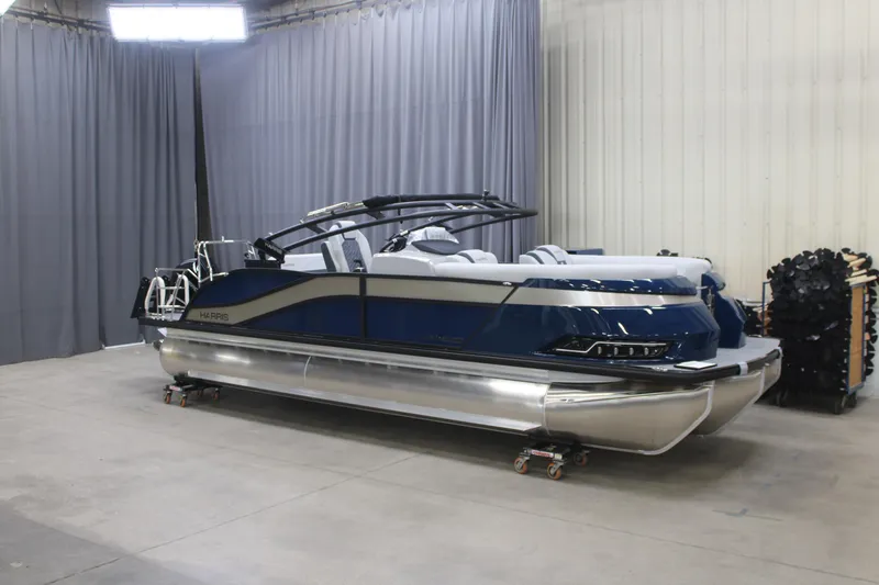 The Image of 2026 Harris Grand Mariner 230 pontoon boat on icy surface, showcasing sleek design. - 2