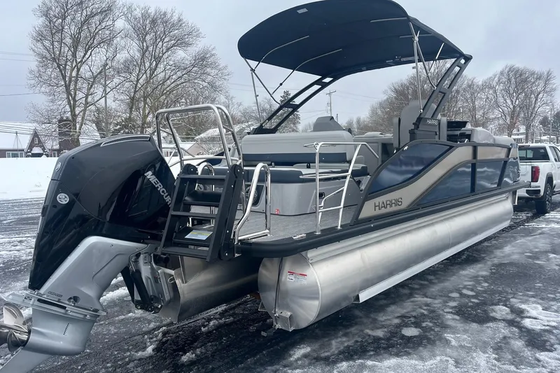 Slide: The Image of 2026 Harris Grand Mariner 230 pontoon boat with Mercury engine on snowy ground. - 6