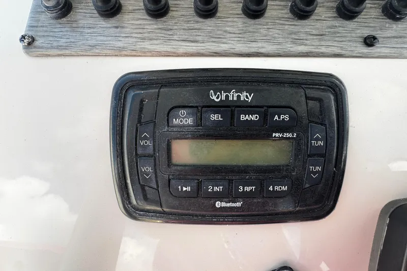 Slide: The Image of Infinity PRV-250.2 Bluetooth stereo on 2019 Sea Chaser 27 HFC boat dashboard. - 12