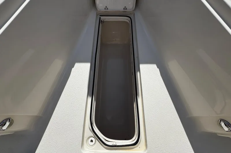 Slide: The Image of 2019 Sea Chaser 27 HFC boat storage compartment, open and empty. - 5