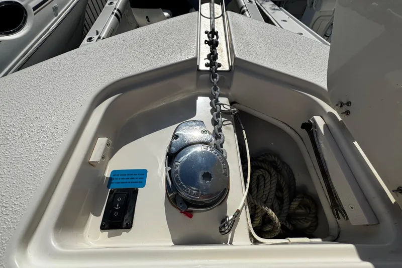 Slide: The Image of 2019 Sea Chaser 27 HFC anchor compartment with chain and rope storage. - 7