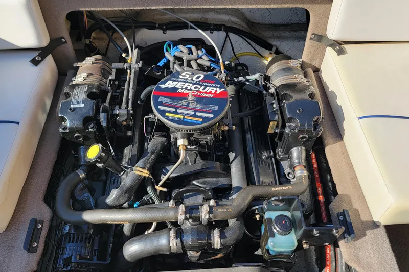 Slide: The Image of Engine of a 2004 Bayliner 215 Classic boat with Mercury MerCruiser 5.0 liter. - 8