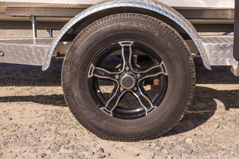 Slide: The Image of Avid 19 FS 2023 model wheel with black alloy rim and tire on gravel. - 17