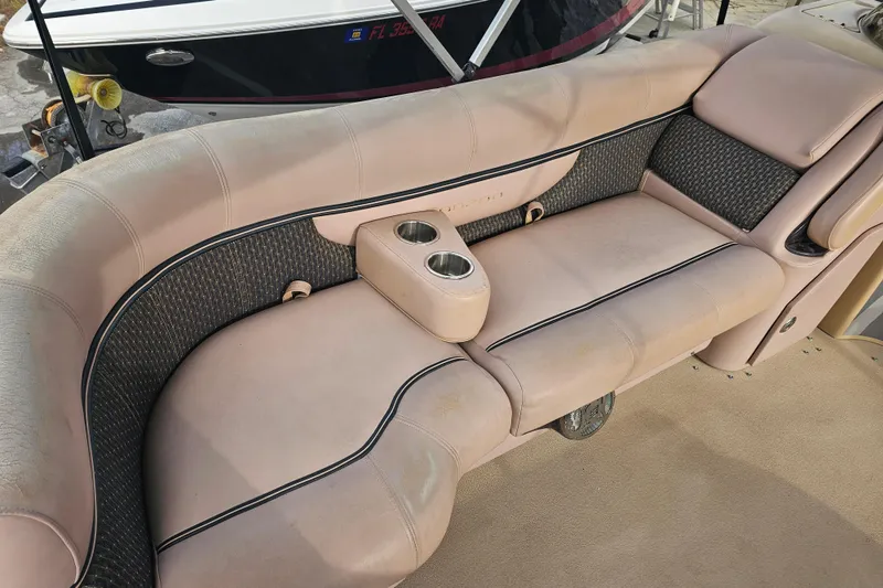Slide: The Image of 2008 Sanpan 2200 RE-3 Gate boat seating with cup holders, beige upholstery. - 13
