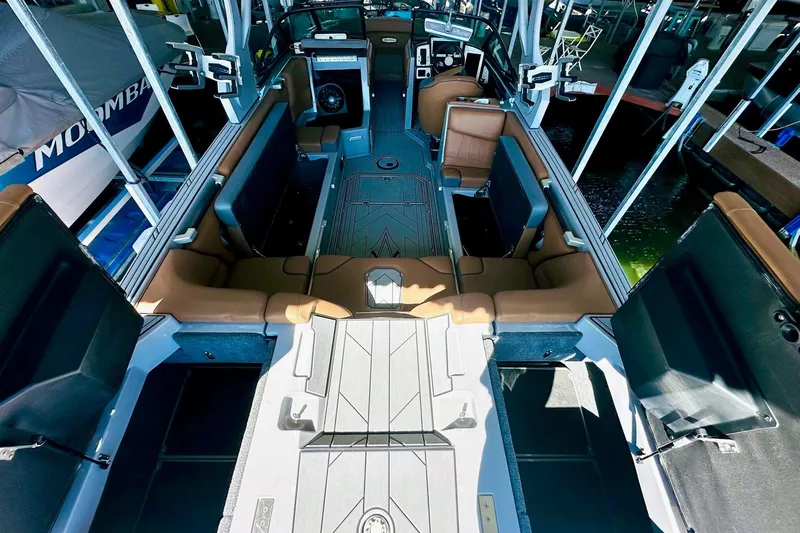 Slide: The Image of 2020 Supra SE550 boat interior with luxurious seating and modern design. - 29