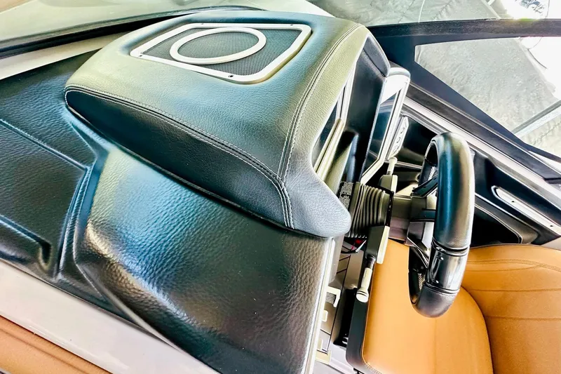 Slide: The Image of 2020 Supra SE550 interior with black leather dashboard and steering wheel. - 30