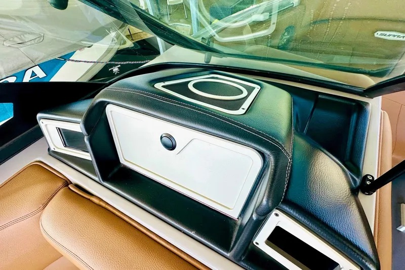 Slide: The Image of 2020 Supra SE550 boat dashboard with leather accents and speaker system. - 31