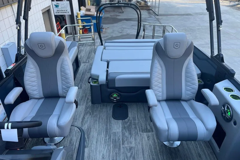 Slide: The Image of 2026 Godfrey Monaco 235 SFL boat interior with luxurious seating and modern design. - 13