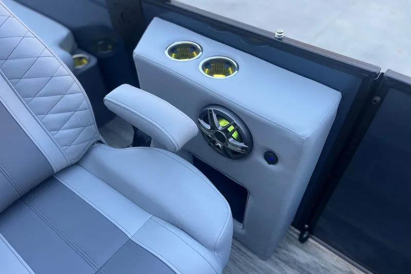 Slide: The Image of Luxurious seating and speaker system on 2026 Godfrey Monaco 235 SFL boat. - 16
