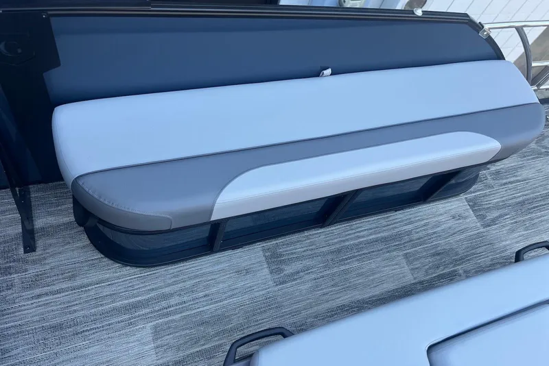 Slide: The Image of 2026 Godfrey Monaco 235 SFL boat seat, gray and white upholstery, modern design. - 20