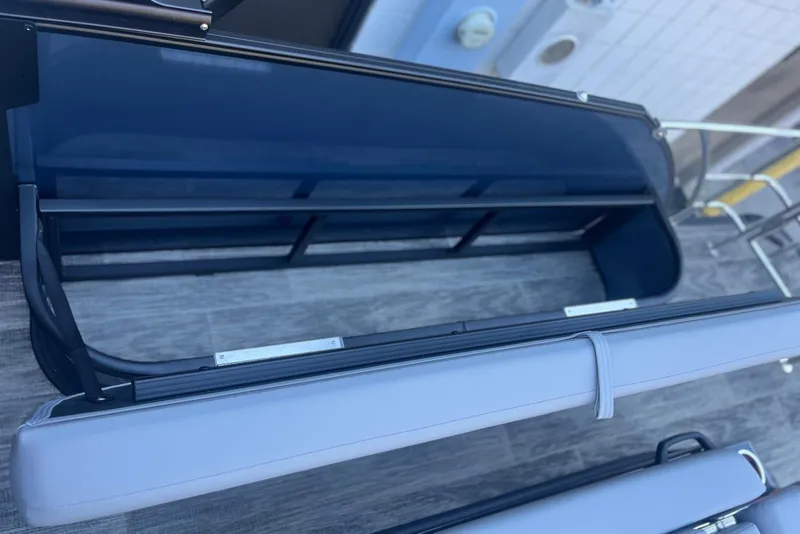 Slide: The Image of 2026 Godfrey Monaco 235 SFL boat interior with sleek seating and modern design. - 21