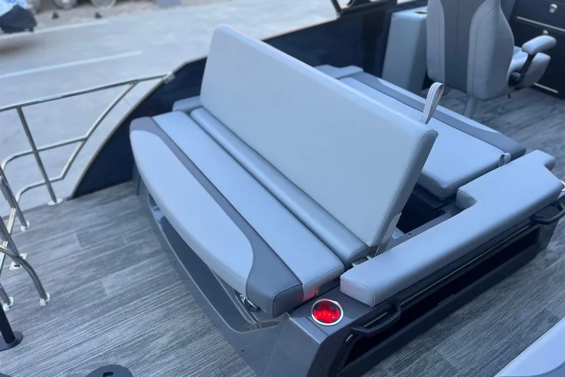 Slide: The Image of 2026 Godfrey Monaco 235 SFL boat interior with gray seating and modern design. - 25