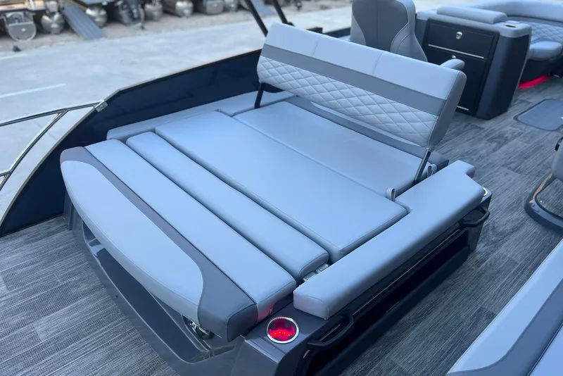 Slide: The Image of 2026 Godfrey Monaco 235 SFL boat interior with luxurious gray seating and modern design. - 27