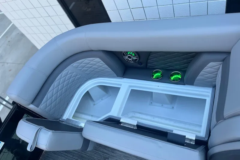 Slide: The Image of Luxurious seating with built-in speakers and cup holders on 2026 Godfrey Monaco 235 SFL. - 9