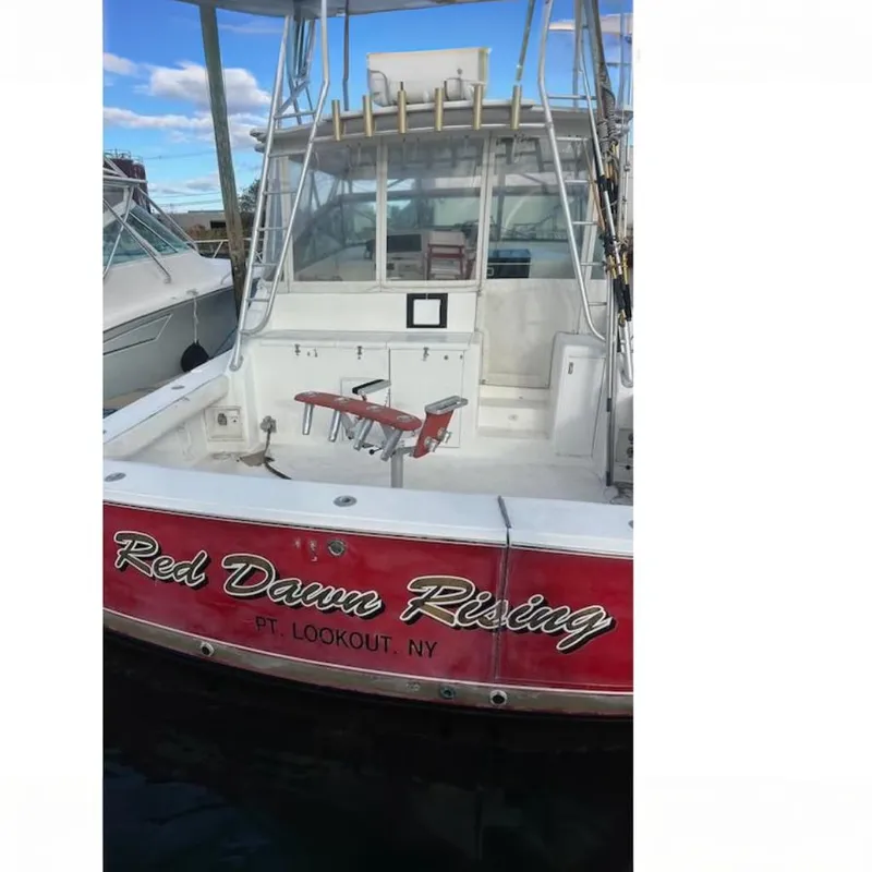 The Image of 1997 Viking 43 Express boat named "Red Dawn Rising" docked at Pt. Lookout, NY. - 0