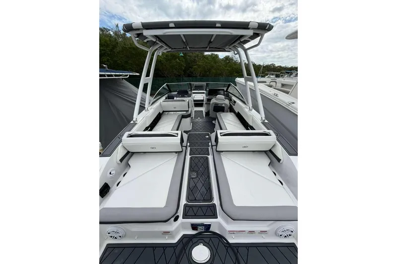 Slide: The Image of 2021 Cobalt R6 boat interior with spacious seating and modern design. - 4