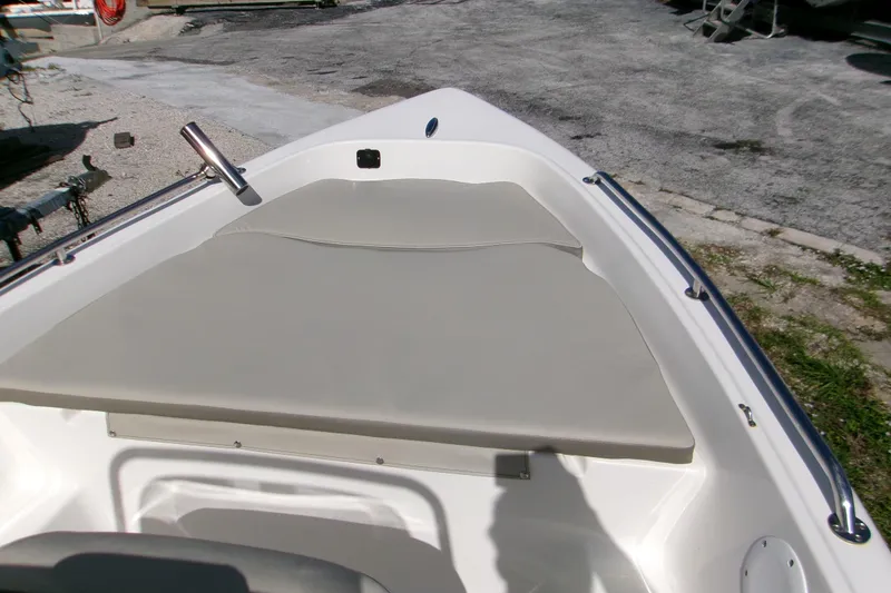 Slide: The Image of 2024 Key West 1720 Center Console boat interior with cushioned seating. - 11