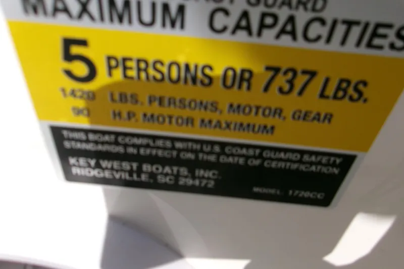 Slide: The Image of 2024 Key West 1720 Center Console capacity label, 5 persons or 737 lbs maximum. - 16