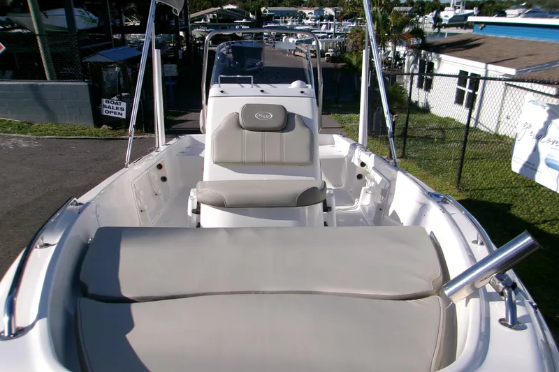 Slide: The Image of 2024 Key West 1720 Center Console boat interior with seating and console view. - 17