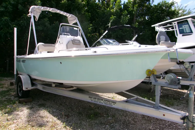 Slide: The Image of 2024 Key West 1720 Center Console boat on trailer, parked outdoors. - 9