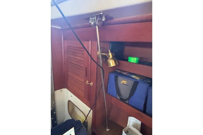 Slide: The Image of Interior of 1986 Catalina 36 MK I sailboat, featuring cozy cabin space. - 25