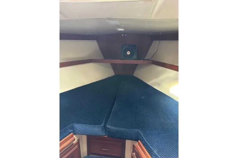 Slide: The Image of Interior of 1986 Catalina 36 MK I sailboat with wooden furnishings and seating area. - 30