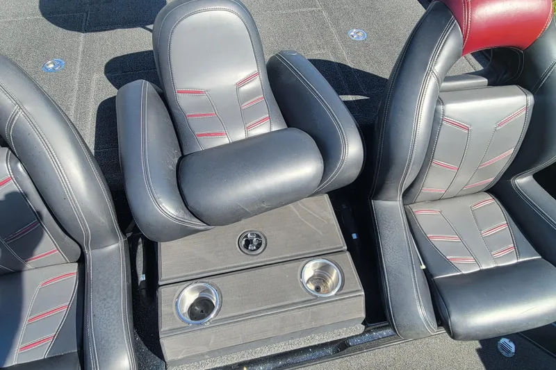 Slide: The Image of 2017 Nitro Z21 Pro boat seats with cup holders and sleek black design. - 21